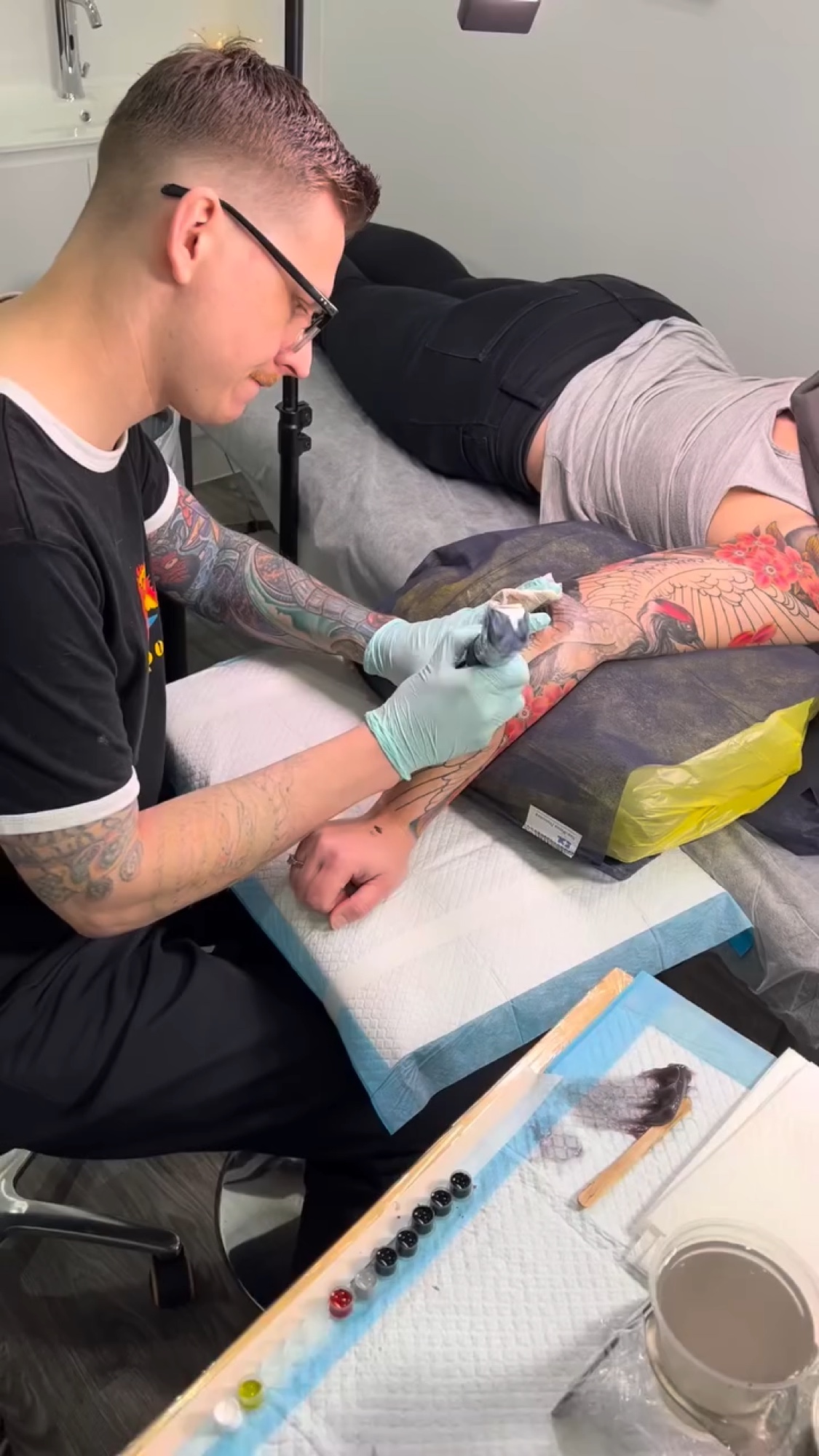 Levi Taylor tattooing a large-scale Japanese leg piece at NEST Studio, Melbourne