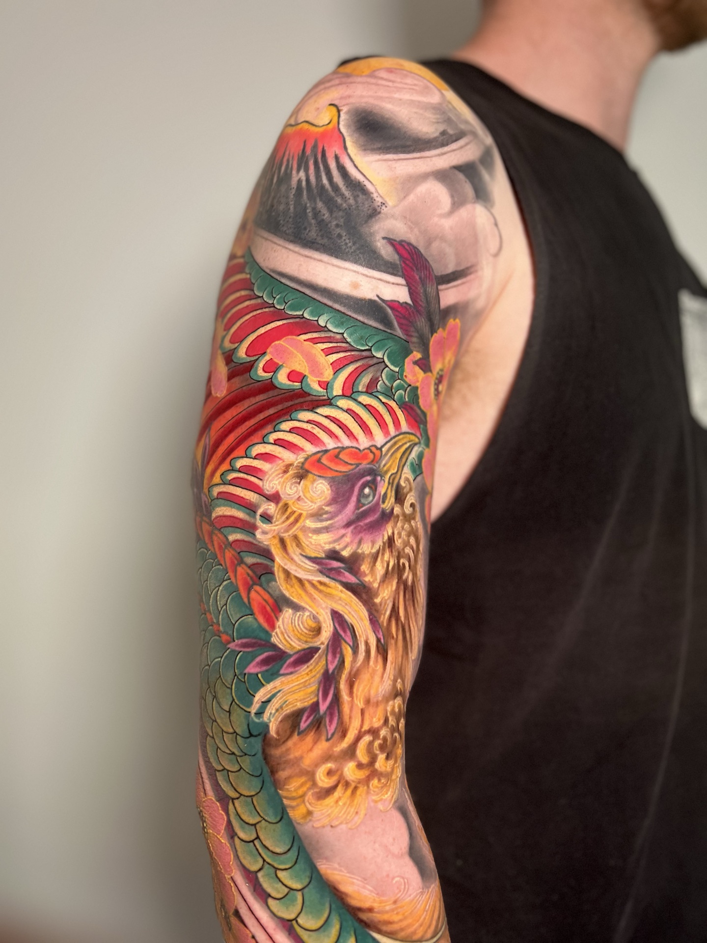 Phoenix and Mount Fuji colour sleeve tattoo by Levi Taylor, NEST Studio, Melbourne